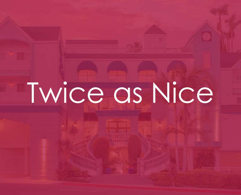 Image of the hotel with a banner saying "twice as nice"