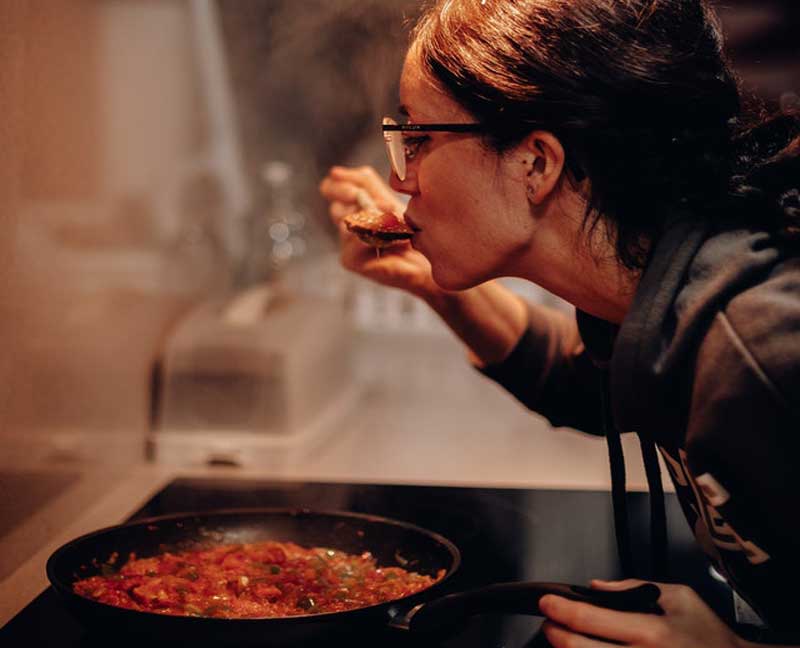 Image of a lady cooking